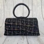 Hana Black & Bronze Squoval Abstract Print With A Metallic Bronze Leather